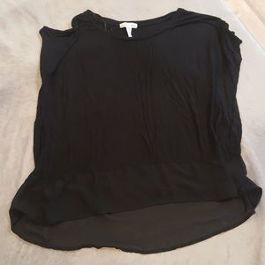Loose fitting blouse with see-through bottom